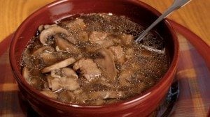 To enhance the mushroom flavor of this soup, sauté the mushrooms in a small amount of butter before adding to the meat mixture.