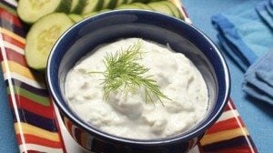 Tzatziki is a classic Greek cucumber sauce that can be used as a dip with fresh vegetables and toasted pita slices but its cool, refreshing taste is best when used to top grilled and roasted meats like lamb burgers and gyros.