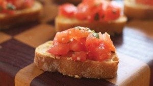 Oh, the bounty of summer. Bruschetta, pronounced “brus-ketta,” is a great way to capture the flavors of ripe summer tomatoes, fresh garden basil and garlic. The vinegar adds a pleasant bite.
