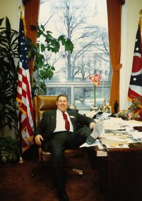 Kenny Walter lounging in office