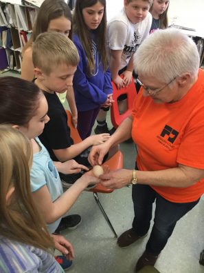 Farm Bureau volunteer & retired teacher Connie Crawford conducts 'egg'speriments with the students at Stanton Elementary School.